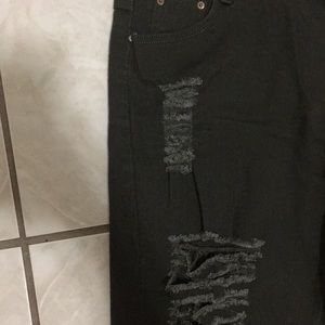 Destroyed olive green jeans